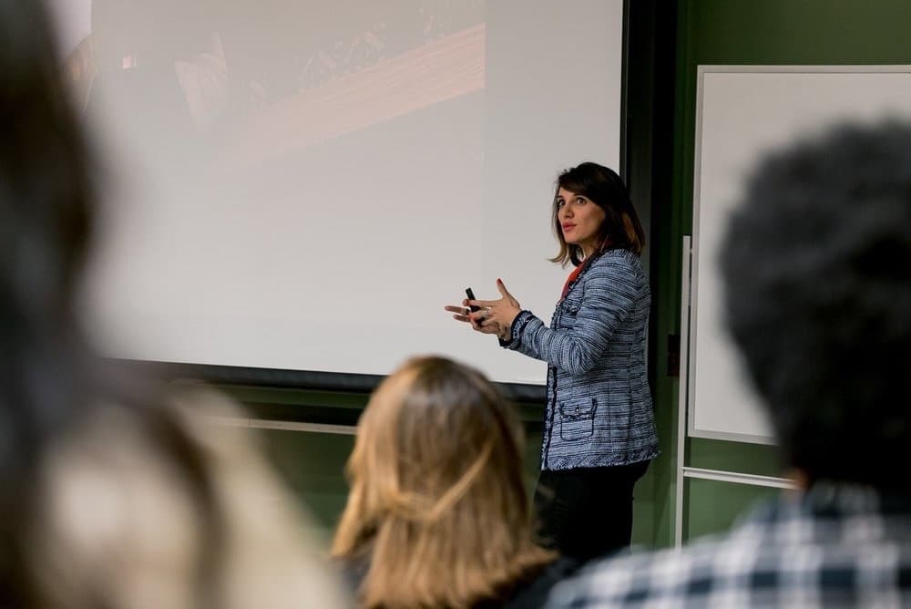 Sura presenting to a class