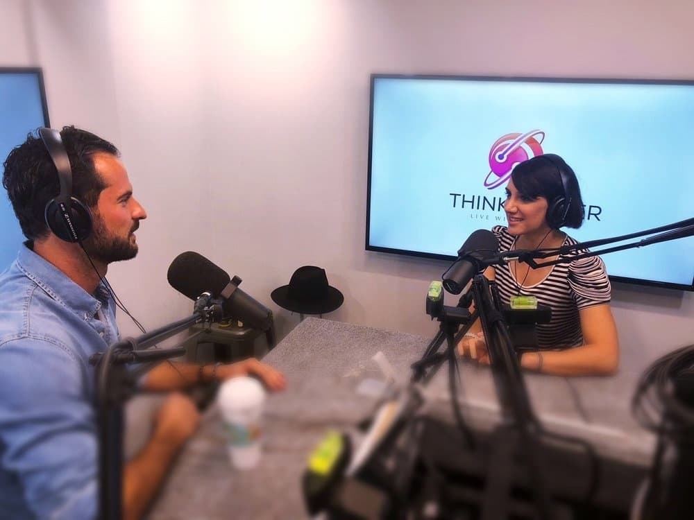 Sura as a guest in the Think Clever podcast studio